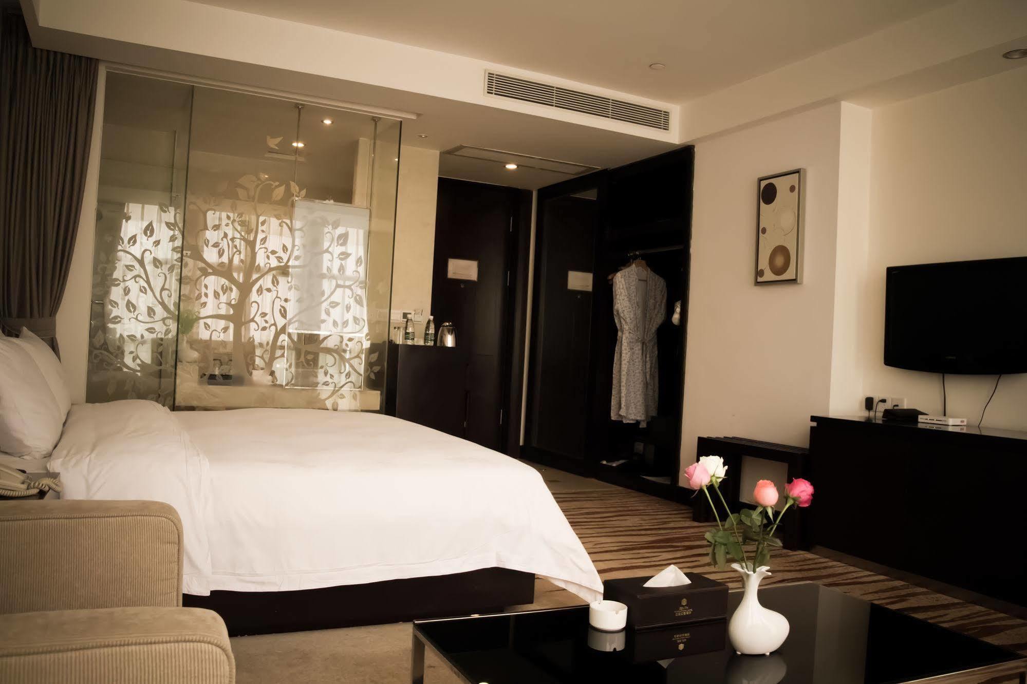 גואנגג'ואו Ximala Business Hotel מראה חיצוני תמונה