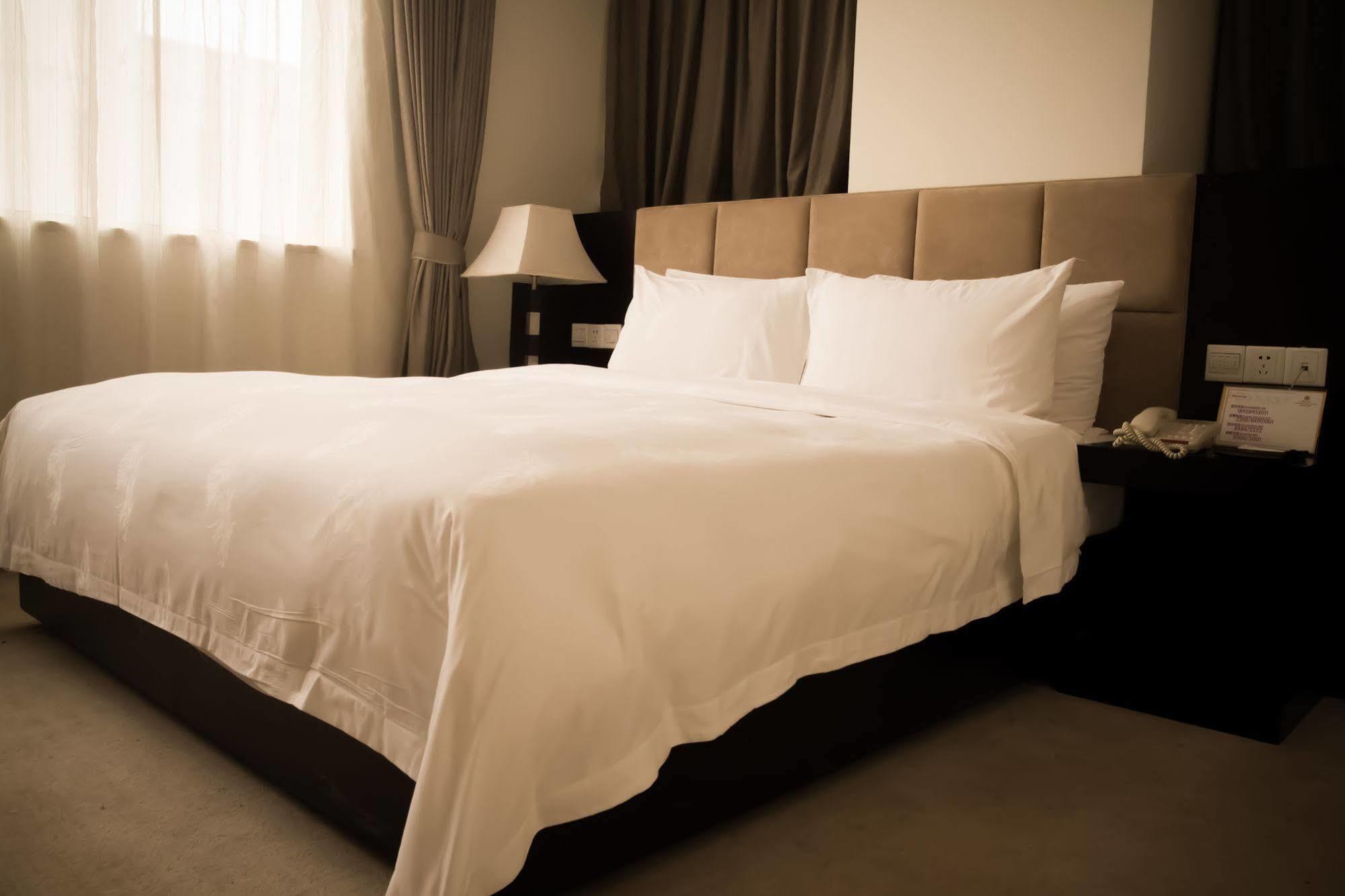 גואנגג'ואו Ximala Business Hotel מראה חיצוני תמונה