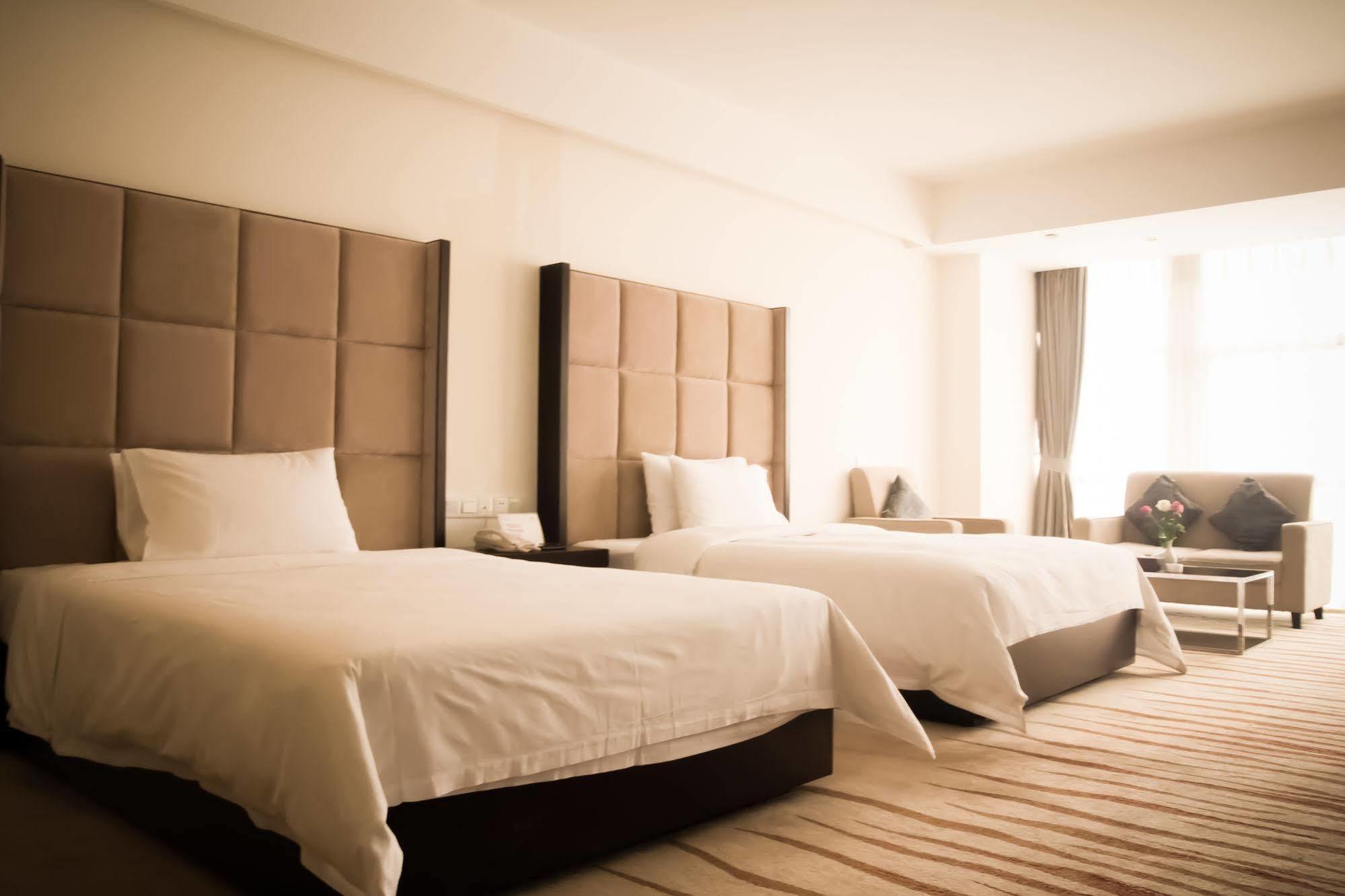 גואנגג'ואו Ximala Business Hotel מראה חיצוני תמונה