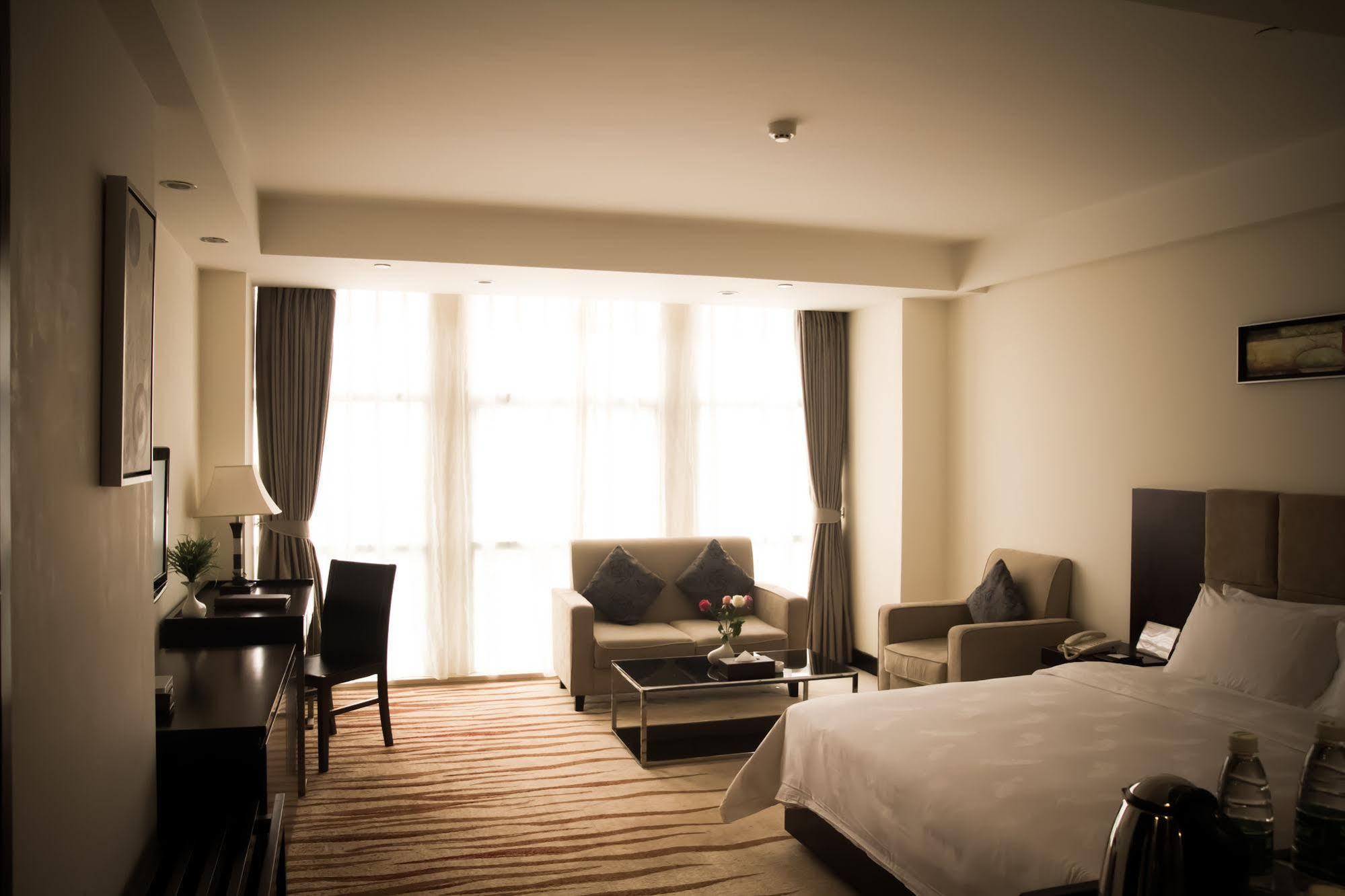 גואנגג'ואו Ximala Business Hotel מראה חיצוני תמונה