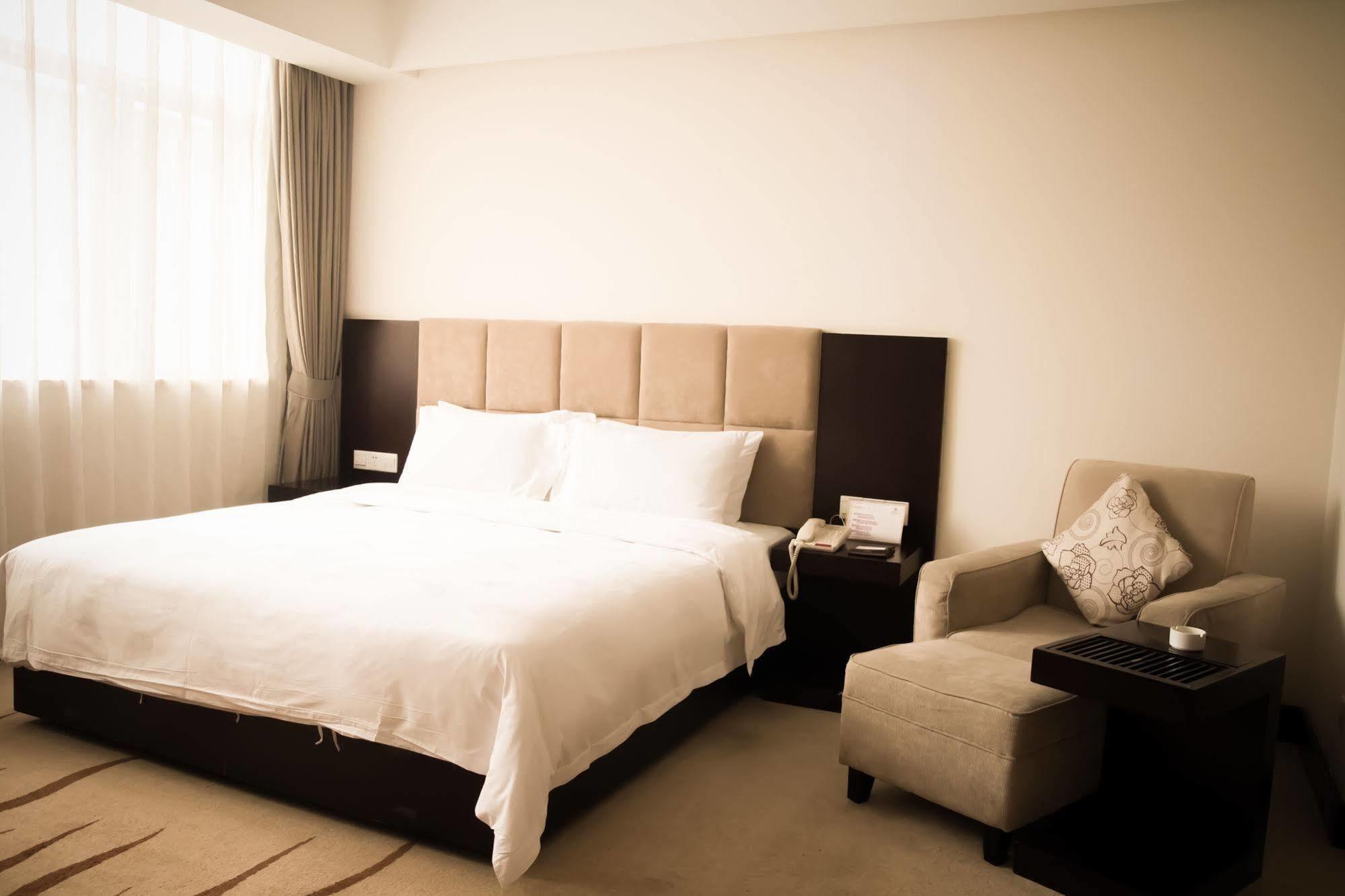 גואנגג'ואו Ximala Business Hotel מראה חיצוני תמונה