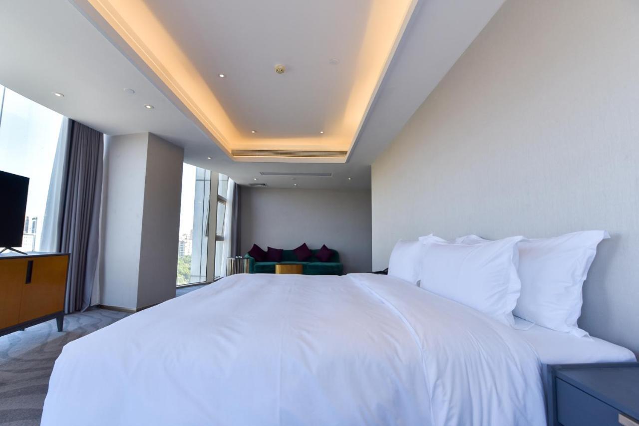 גואנגג'ואו Ximala Business Hotel מראה חיצוני תמונה