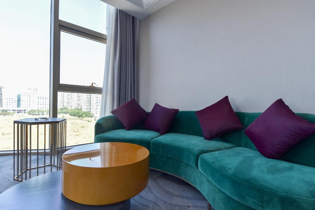 גואנגג'ואו Ximala Business Hotel מראה חיצוני תמונה
