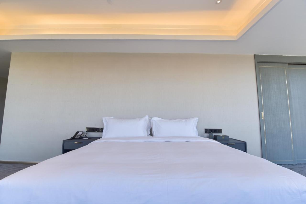גואנגג'ואו Ximala Business Hotel מראה חיצוני תמונה