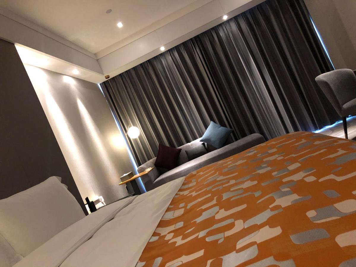 גואנגג'ואו Ximala Business Hotel מראה חיצוני תמונה