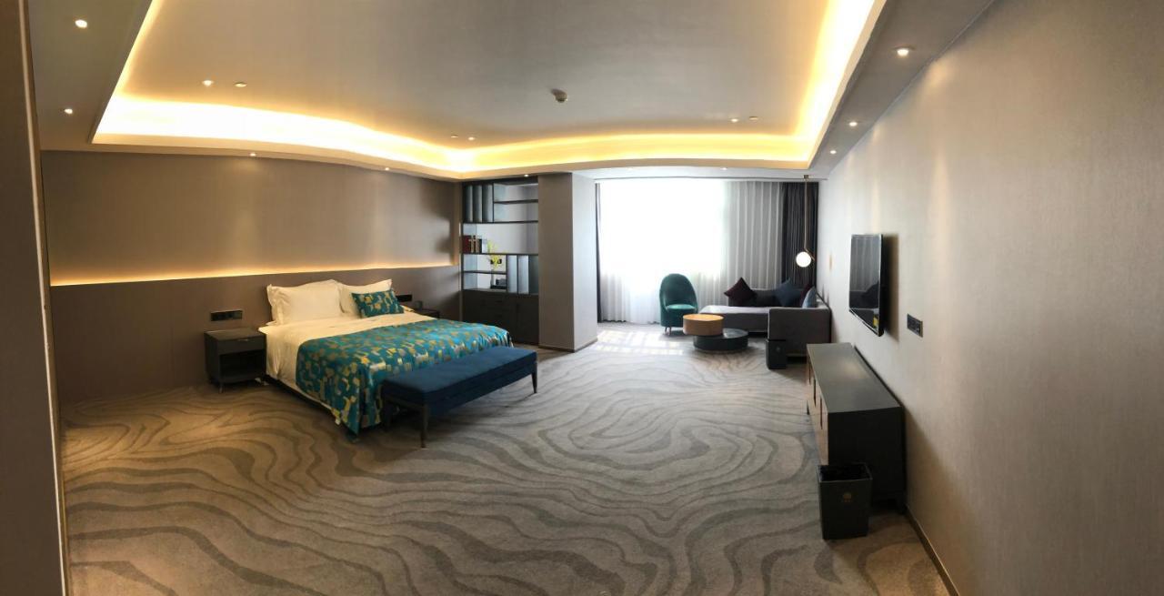 גואנגג'ואו Ximala Business Hotel מראה חיצוני תמונה