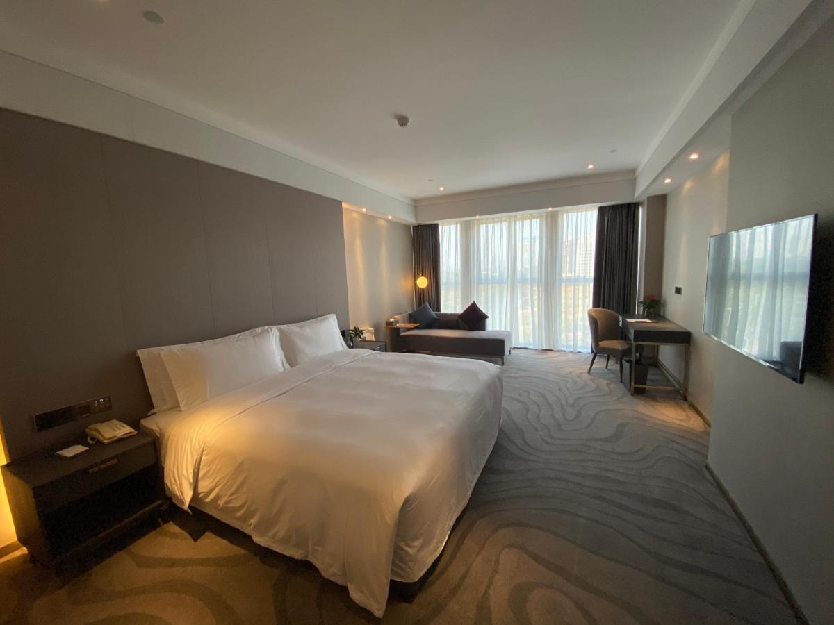 גואנגג'ואו Ximala Business Hotel מראה חיצוני תמונה