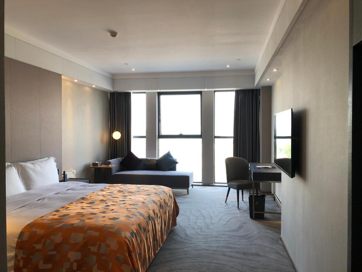 גואנגג'ואו Ximala Business Hotel מראה חיצוני תמונה