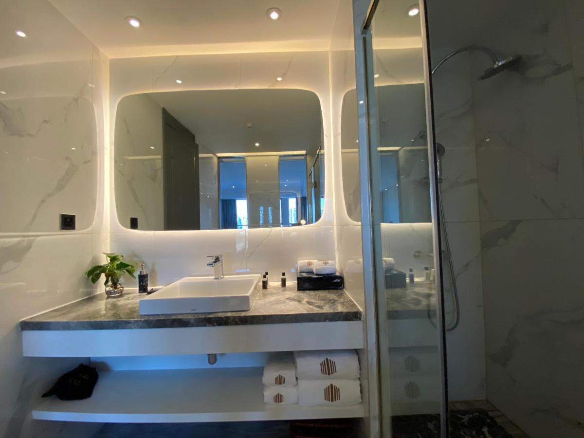 גואנגג'ואו Ximala Business Hotel מראה חיצוני תמונה