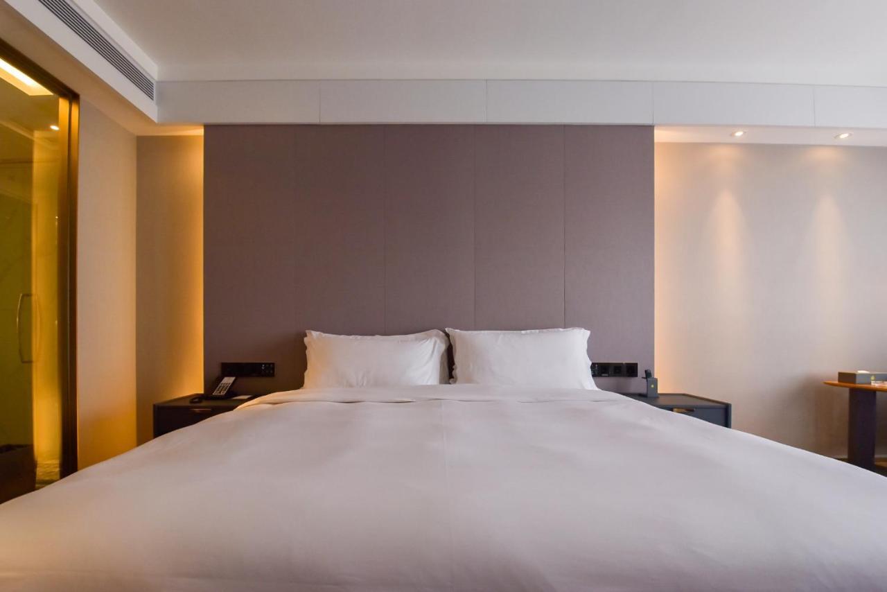 גואנגג'ואו Ximala Business Hotel מראה חיצוני תמונה