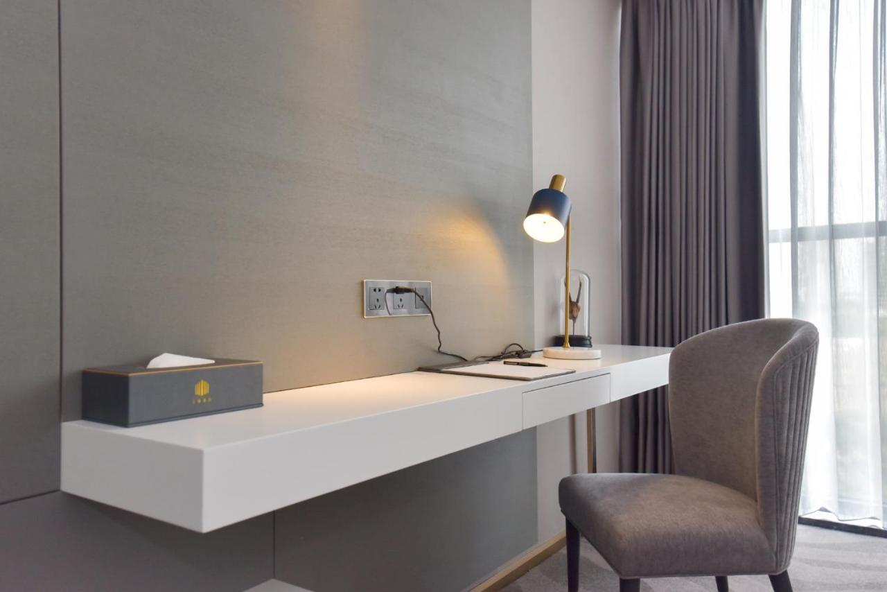 גואנגג'ואו Ximala Business Hotel מראה חיצוני תמונה