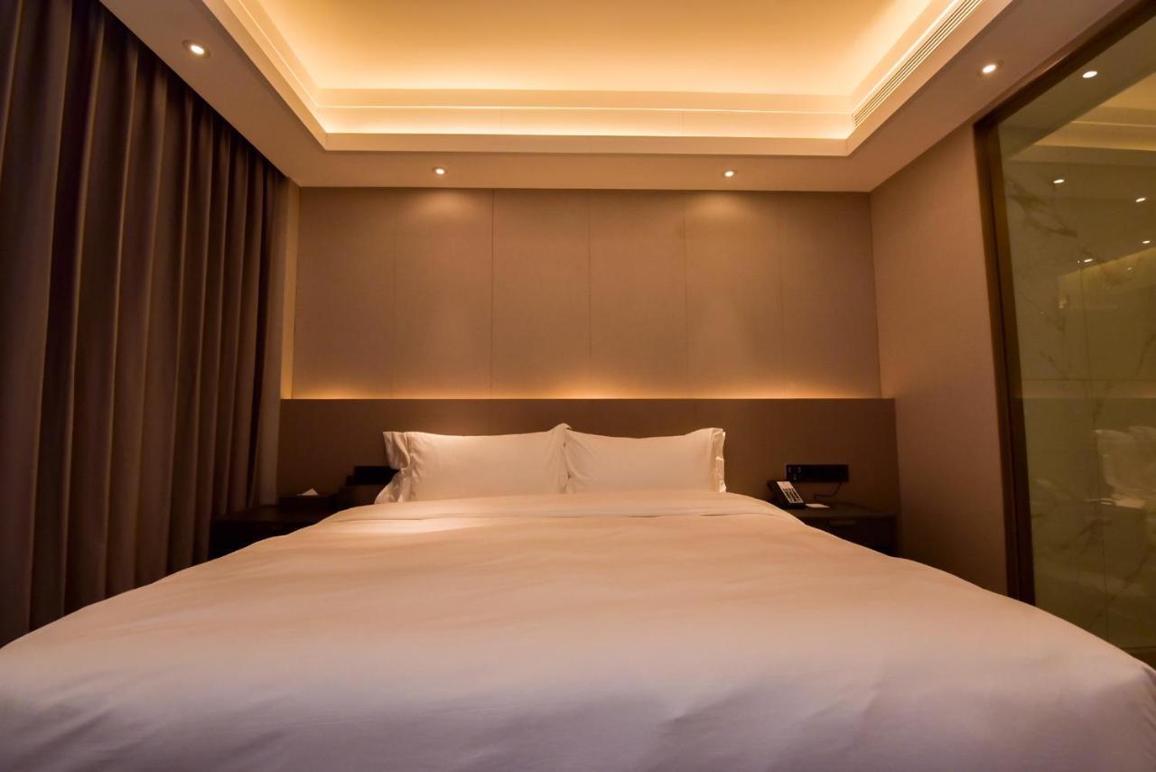גואנגג'ואו Ximala Business Hotel מראה חיצוני תמונה