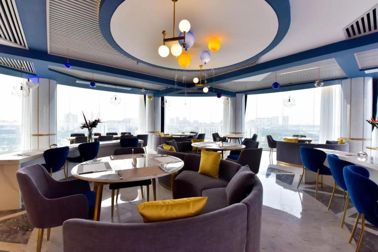 גואנגג'ואו Ximala Business Hotel מראה חיצוני תמונה