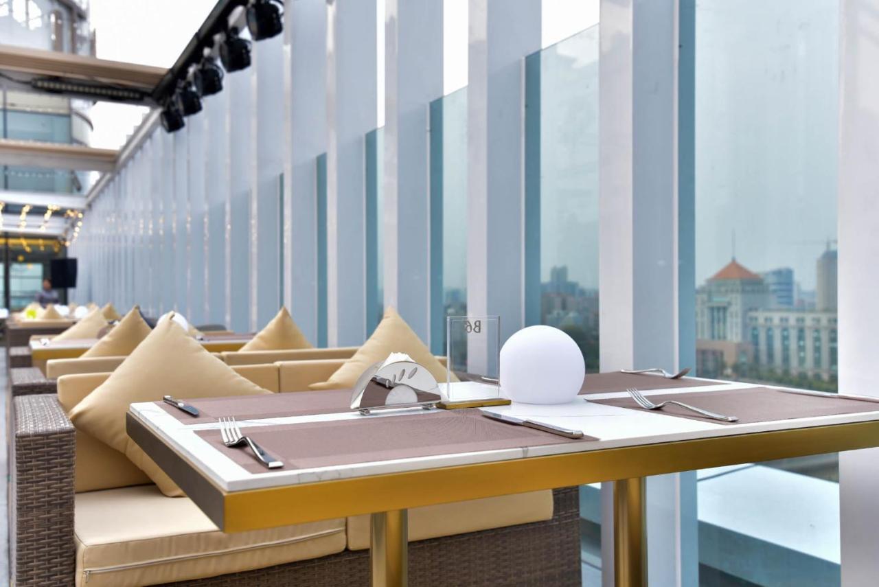 גואנגג'ואו Ximala Business Hotel מראה חיצוני תמונה