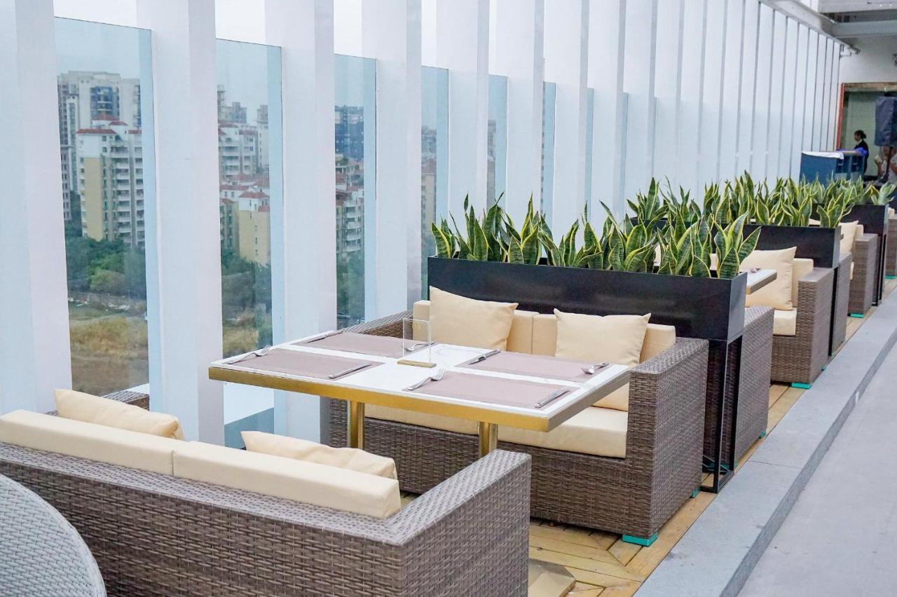 גואנגג'ואו Ximala Business Hotel מראה חיצוני תמונה